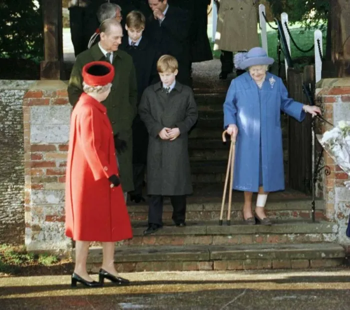 Framed Print : Prince Philip and the Queen watch as the Queen Mother walks down steps at Sandringham