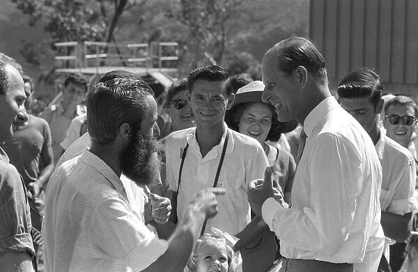 Prince Philip talks with the crowds during a Royal visit to Australia. March 1963