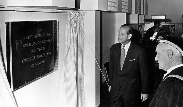Prince Philip visiting Wales. The Duke of Edinburgh unveils a commemorative plaque during