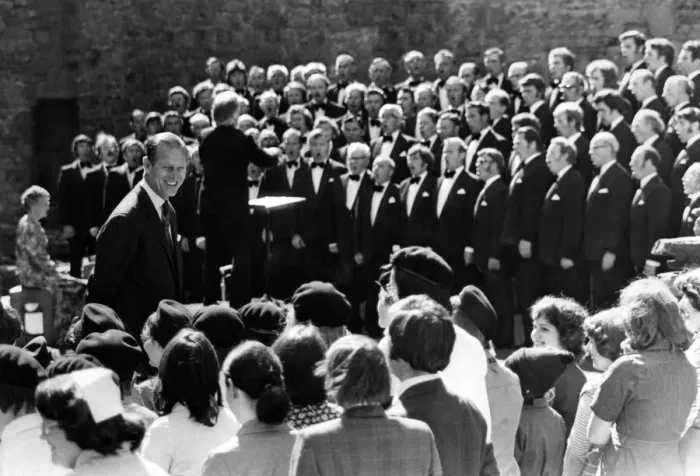 Framed Print : Prince Philip visiting Wales. The Duke of Edinburgh smiling at local children as Framed Print : Prince Philip visiting Wales. The Duke of Edinburgh smiling at local children as