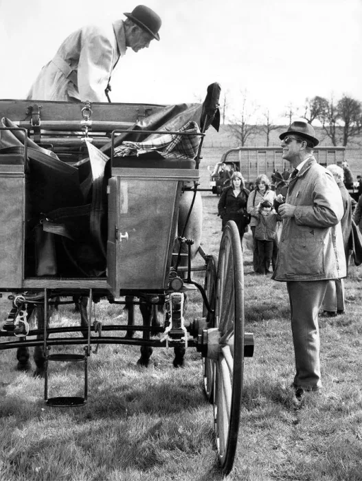 Framed Print : Prince Phillip the Duke of Edinburgh enjoying his favourite pastime talking to someone