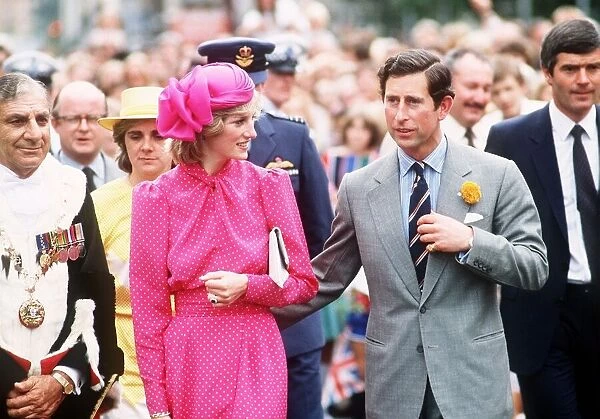 Prince and Princess of Wales atan open-air children