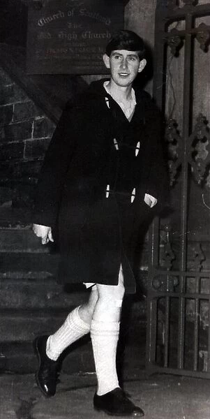 Prince of Wales 1965 a teenage Charles wearing a duffle coat leaving Inverness old High