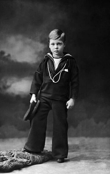 Prince of Wales at the age of Seven poses for a portrait in his sailor suit