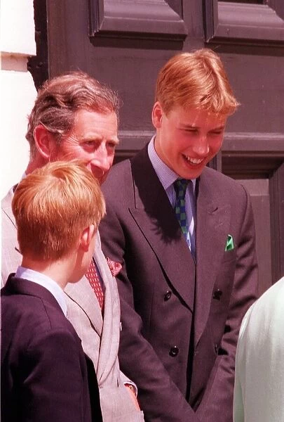Prince William at Clarence House August 1998 smiles as he chats with his father