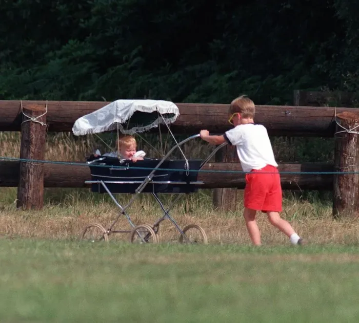 Framed Print : Prince William Collection 1989 Prince William pushing Princess Beatrice in pram Framed Print : Prince William Collection 1989 Prince William pushing Princess Beatrice in pram