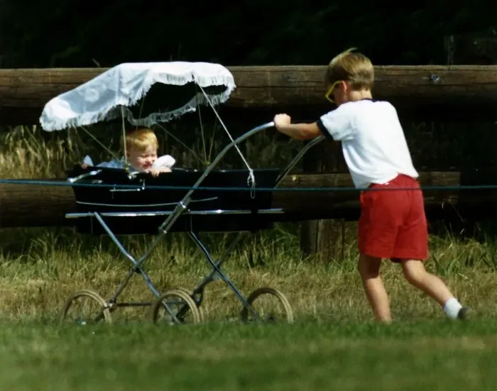 Framed Print : Prince William Collection 1989 Princess Beatrice in pram being pushed by her cousin Framed Print : Prince William Collection 1989 Princess Beatrice in pram being pushed by her cousin