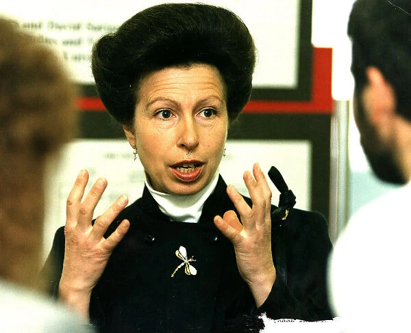 Princess Anne visit to Edinburgh Zoo both hands up no rings on fingers