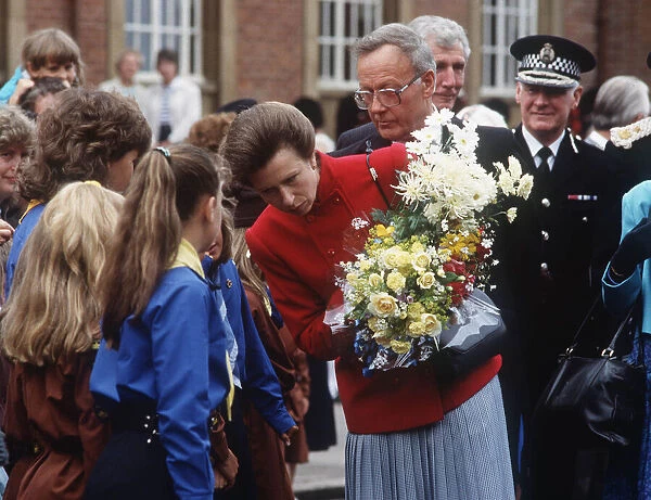 Princess Anne on walkabout in Ayrshire Scotland 1989 with girl guides and flowers