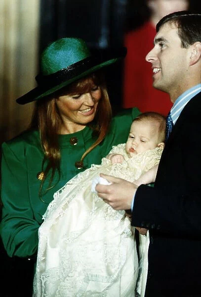 Princess Beatrice being held by her mother and father Duchess Of York