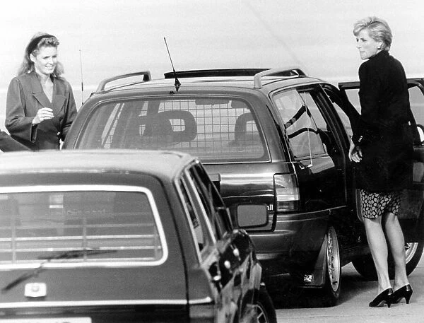 Princess Diana at Aberdeen airport with the Duchess of York Sarah Ferguson en route to