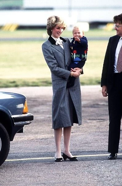 Princess Diana with her baby son Prince William at Aberdeen airport