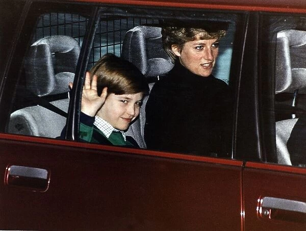 Princess Diana in the back of a car with her son Prince William. 9th January 1991