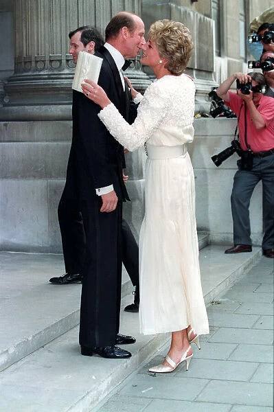 PRINCESS DIANA AND THE DUKE OF KENT EMBRACE AND KISS, BEFORE ATTENDING THE MAGIC FLUTE