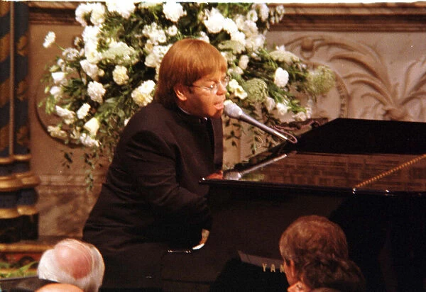 Princess Diana Funeral 6th September 1997. Elton John sitting at the piano