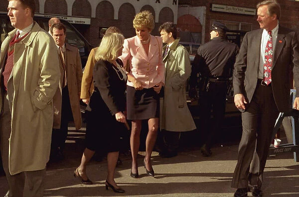 Princess Diana in Harlem wearing black skirt, black tights and creme jacket (undated)