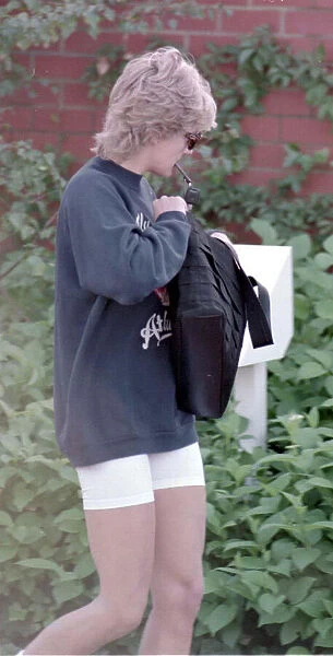 Princess Diana heads to a gym in Chelsea wearing a blue sweat shirt