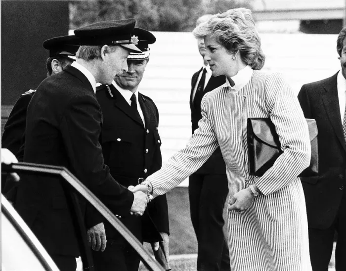 Framed Print : Princess Diana meets fire crew who attended the scene of the British Airtours passenger