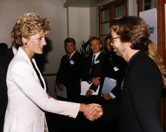 Framed Print : Princess Diana meets musician and singer Eric Clapton Rock at the charity film premiere Framed Print : Princess Diana meets musician and singer Eric Clapton Rock at the charity film premiere