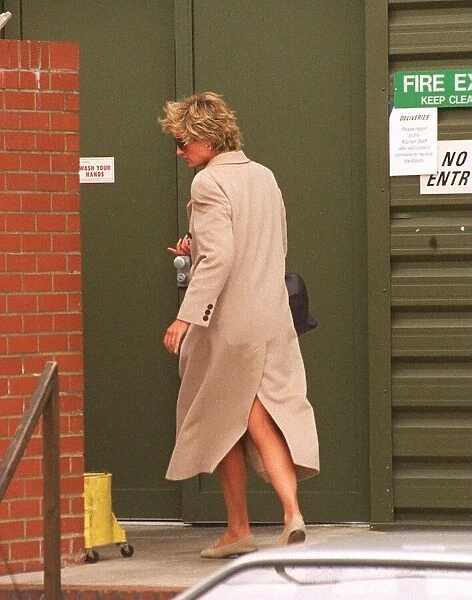 Princess Diana outside The Harbour Club watched by reporters with eagle eyes after her