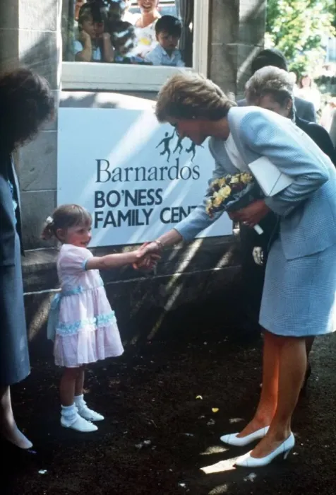 Framed Print : Princess Diana pictured with nursery school children during a visit to the Barnardo