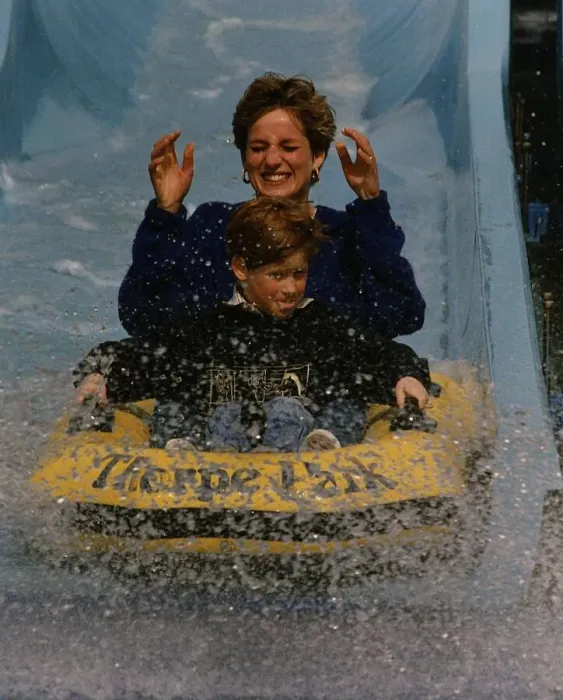 Framed Print : Princess Diana and Prince Harry on a water slide ride in Thorpe Park amusement park Framed Print : Princess Diana and Prince Harry on a water slide ride in Thorpe Park amusement park