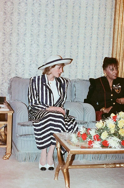Princess Diana with Princess Mariam upon her arrival at the airport in Kuwait