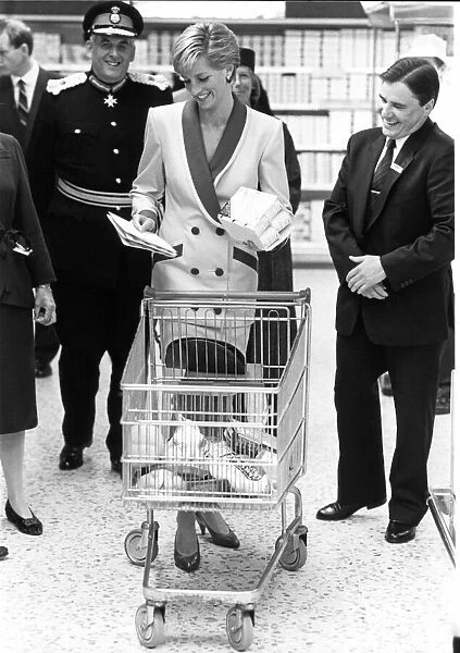 Princess Diana, The Princess of Wales, takes a shopping trolley around Tesco at Southport