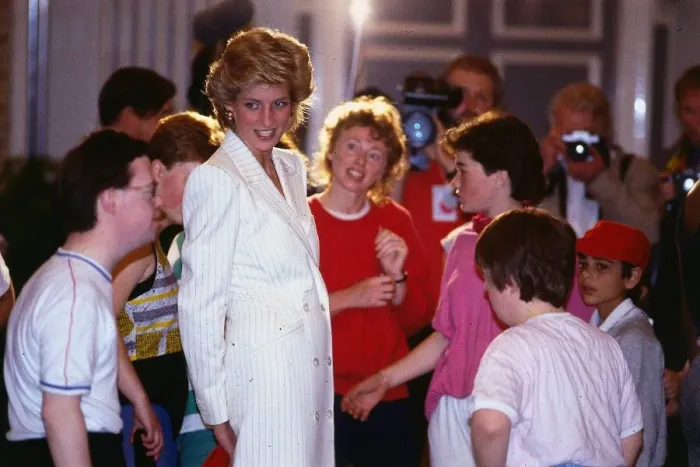 Framed Print : Princess Diana Princess of Wales talking to handicapped children during a visit to