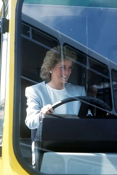 Princess Diana, Princess of Wales at the wheel of a bus during a visit to the Walter