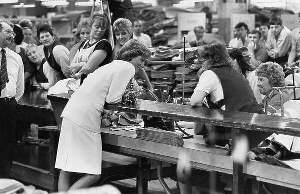Princess Diana seen here chatting with machinists Doreen