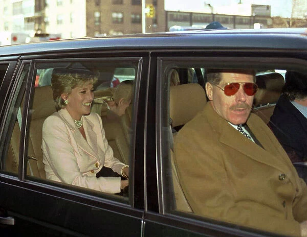 Princess Diana smiling wearing creme jacket in limousine in Harlem, New York