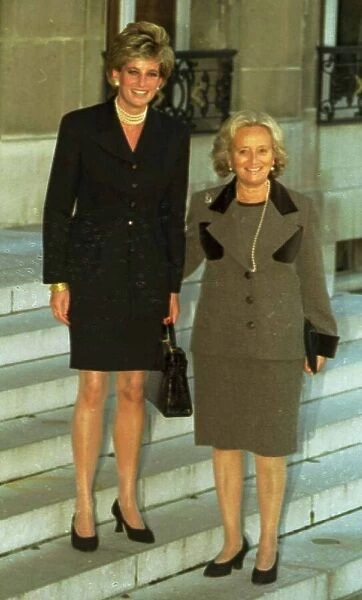 Princess Diana standing beside Madame Bernadette Chirac on the steps of the Elysee