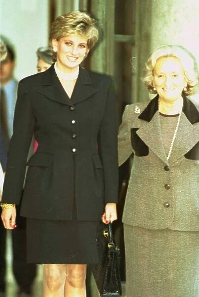 Princess Diana walking beside Madame Bernadette Chirac at the Elysee Palace in in Paris