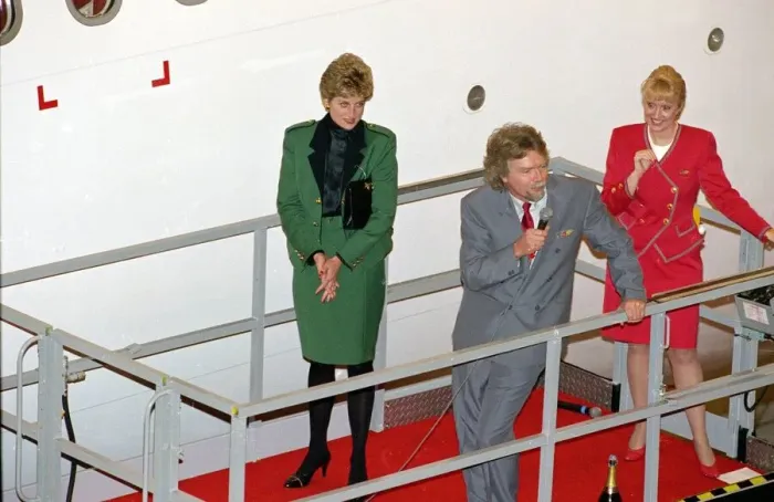 Framed Print : Princess Diana, wearing a green jacket and skirt suit, pictured at the naming ceremony of