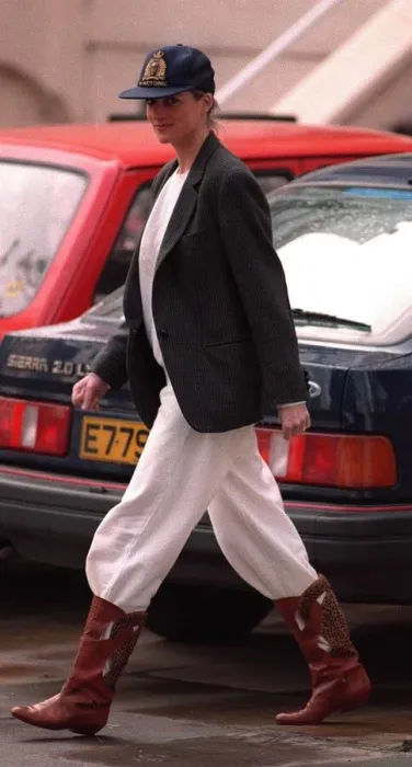 Framed Print : Princess Diana wearing an unusual combination of white trousers, boots Framed Print : Princess Diana wearing an unusual combination of white trousers, boots