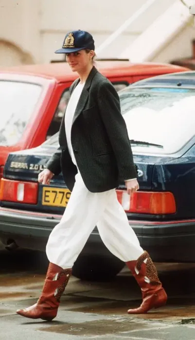 Framed Print : Princess Diana wearing an unusual combination of white trousers, boots Framed Print : Princess Diana wearing an unusual combination of white trousers, boots