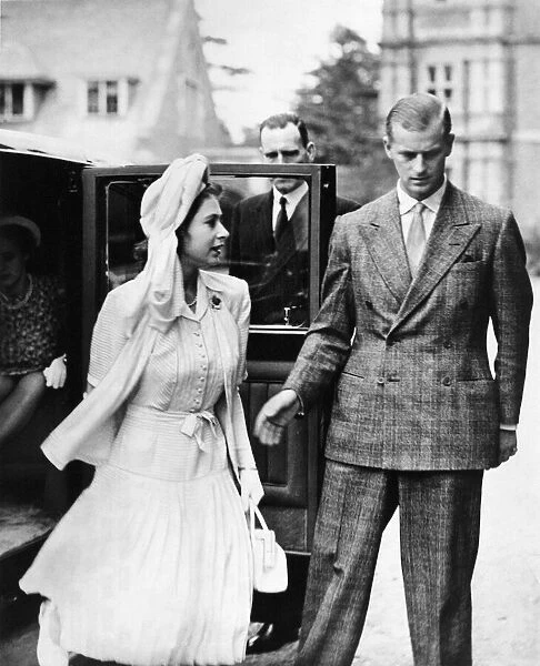 Princess Elizabeth escorted by Lieutenant Philip Mountbatten