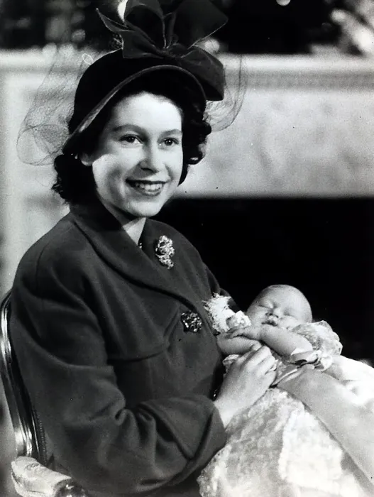 Framed Print : Princess Elizabeth holds her baby son Prince Charles in the drawing room at Buckingham Framed Print : Princess Elizabeth holds her baby son Prince Charles in the drawing room at Buckingham