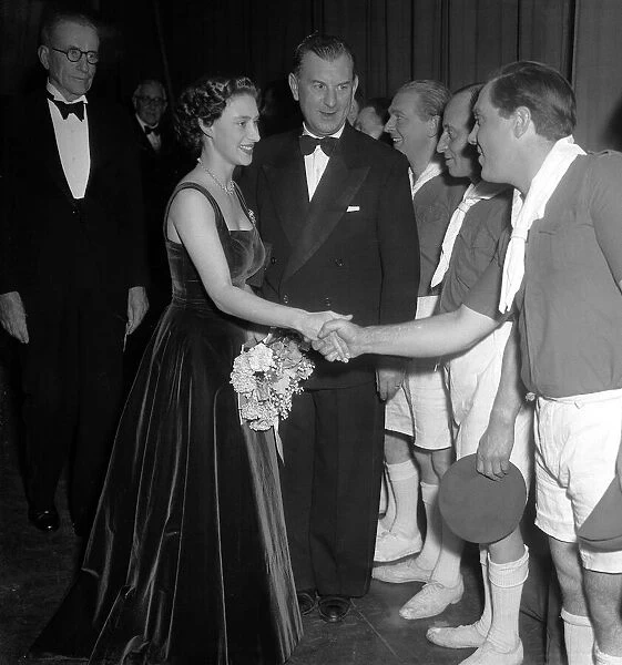 Princess Margaret Dec 1953 is introduce to the members of the cast at