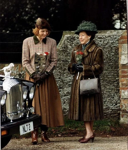 Princess Margaret and the Duchess of York waiting at the church with their hats
