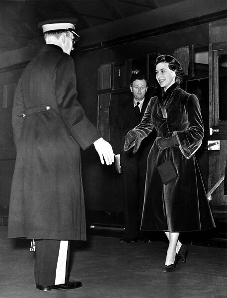 Princess Margaret is greeted by Viscount Allendale as she steps from the train at