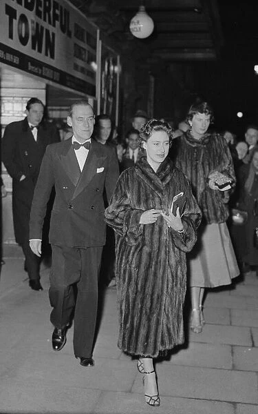 Princess Margaret leaves a West End theatre in London Mar1955 with her escort Billy