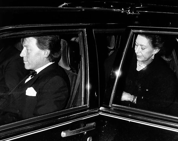 Princess Margaret and Roddy Llewellyn - December 1988 pictured leaving a party in