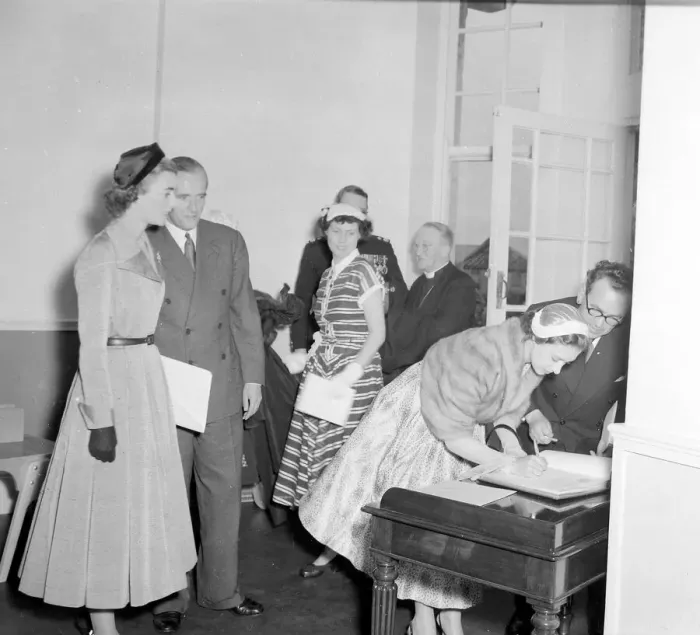 Framed Print : Princess Margaret seen here signing the visitors book during a visit to Sunshine Homes of Framed Print : Princess Margaret seen here signing the visitors book during a visit to Sunshine Homes of