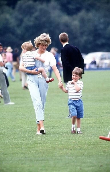 Princess of Wales with Prince Harry and Prince William during a polo match at Smith