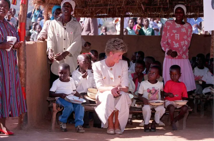 Framed Print : PRINCESS OF WALES SITTING WITH CHILDREN DURING A VISIT TO RED CROSS CHARITY PROJECT IN