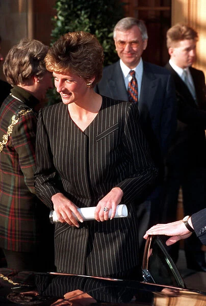 THE PRINCESS OF WALES WEARING A BLACK PINSTRIPE SKIRT SUIT 1993