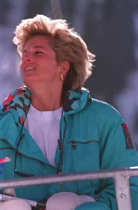 Framed Print : PRINCESS OF WALES WEARING GREEN SKI SUIT SEATED ON SKI CHAIR DURING SKIING HOLIDAY IN