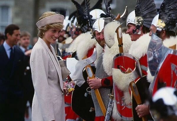 Princesss Diana Princess of Wales talking to men dressed as vikings on a visit to
